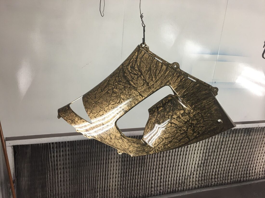 Gold-leaf custom paint on a hood