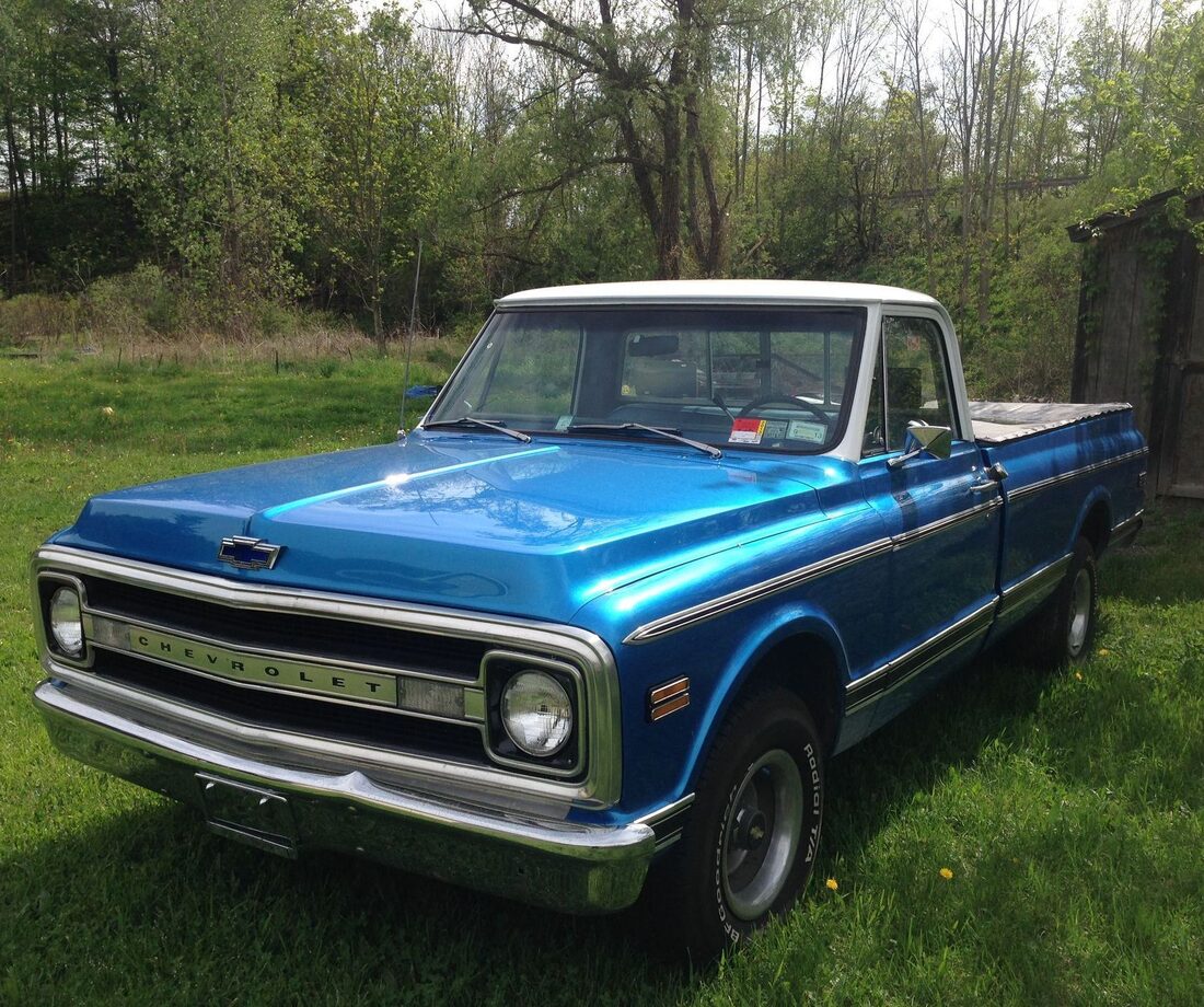 A restored classic pickup truck finished at Just Joe's
